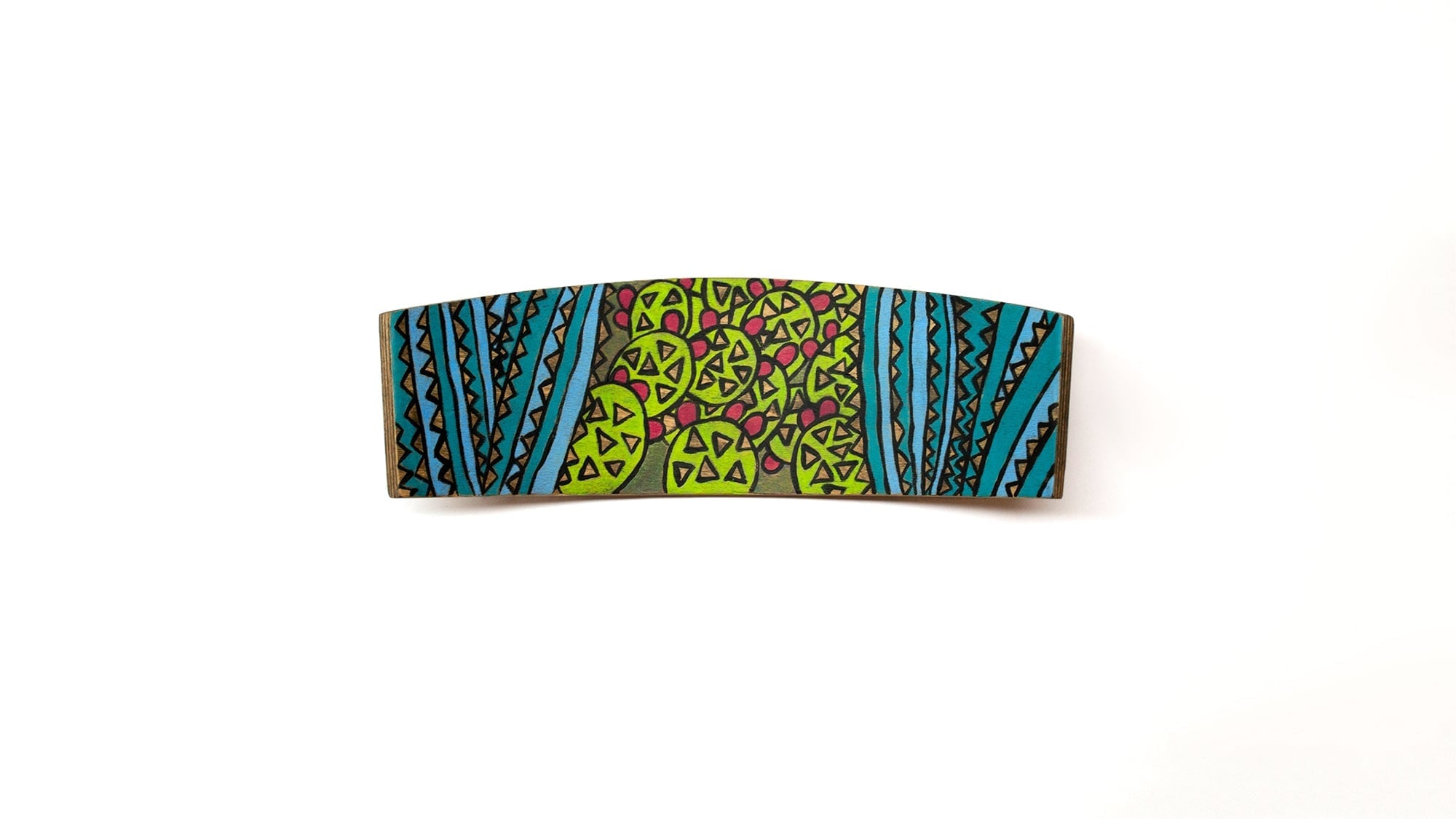 Curved wooden chair backrest painted with prickly pear cactus garden design featuring green cacti with pink fruit, flanked by teal vertical stripes and black zigzag tribal patterns