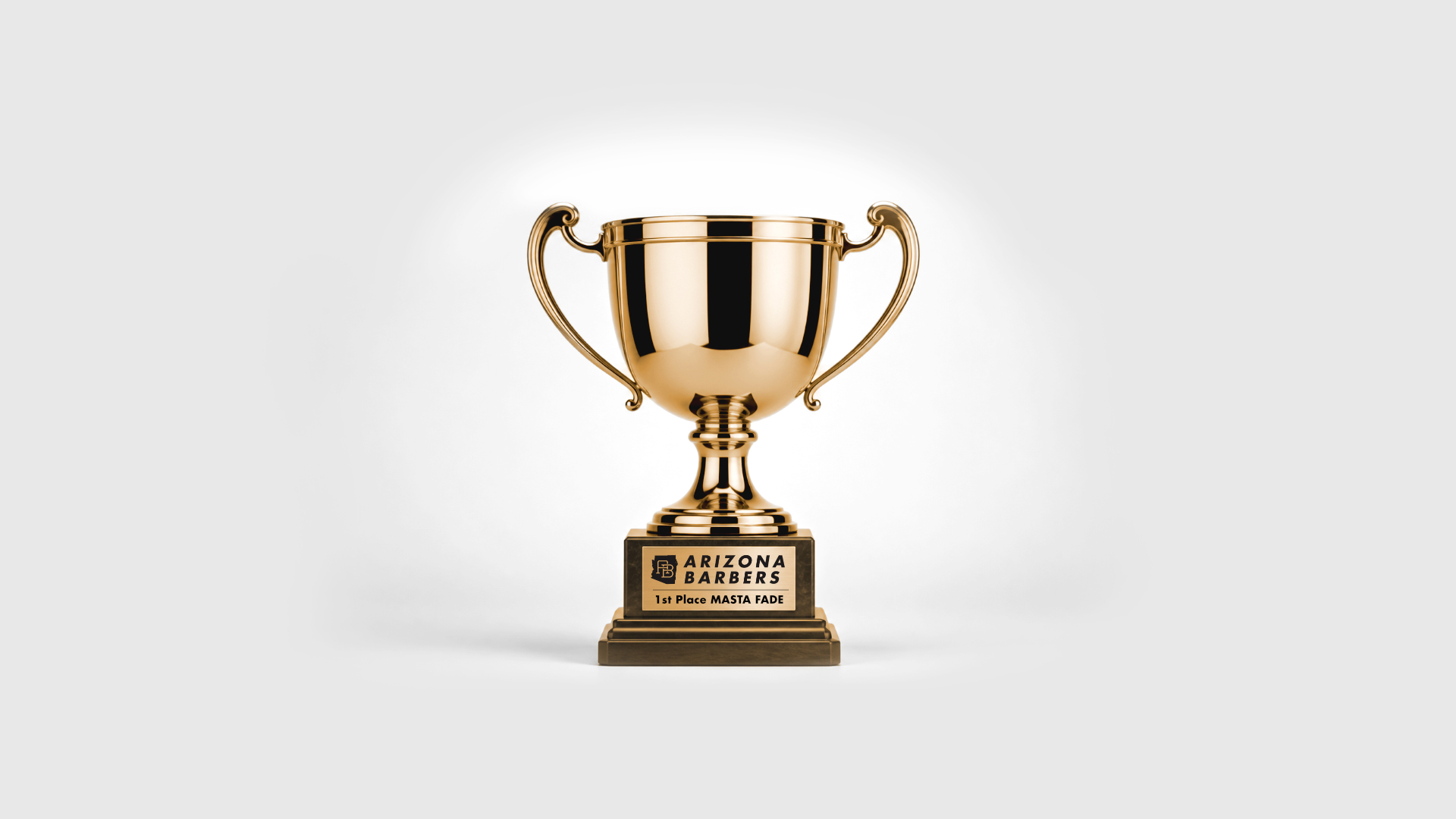 Gold trophy cup with ornate handles on dark wooden base featuring Arizona Barbers logo and 1st Place Masta Fade engraving