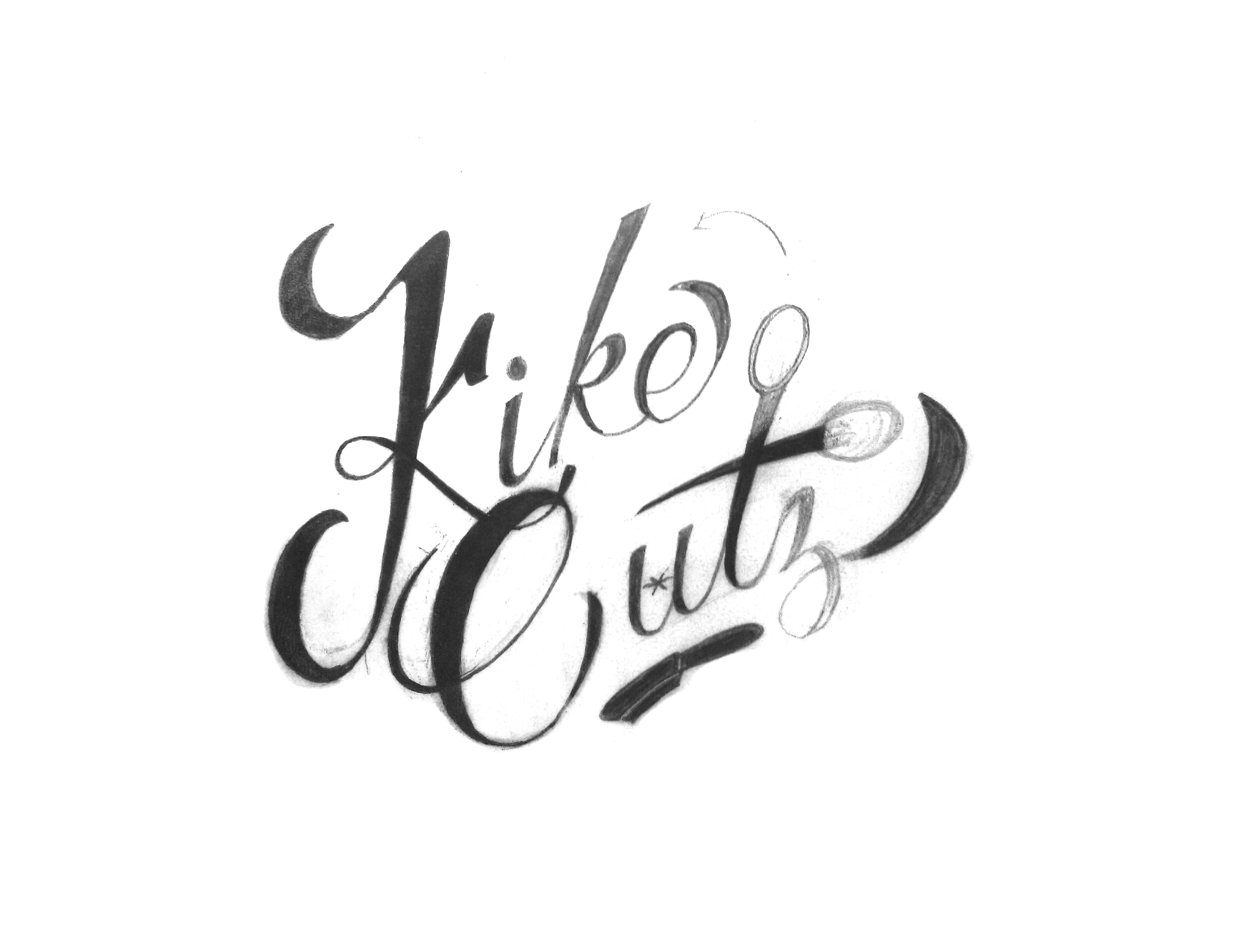 Hand-drawn pencil sketch of Kike Cutz script logo on white paper with brush pen lettering showing early design exploration