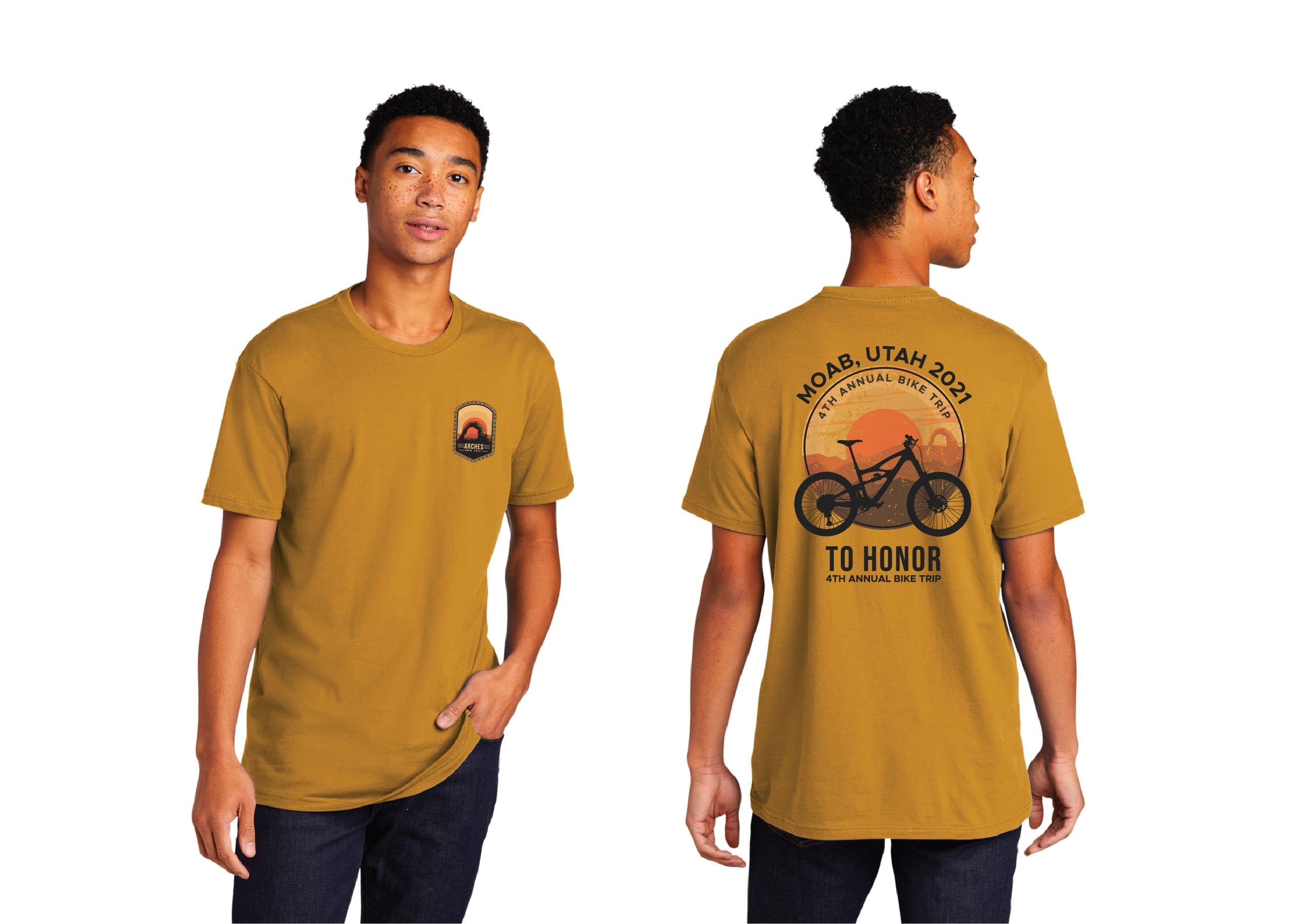 Mustard event shirt with Arches chest patch and a mountain-bike desert landscape graphic for a Moab group ride