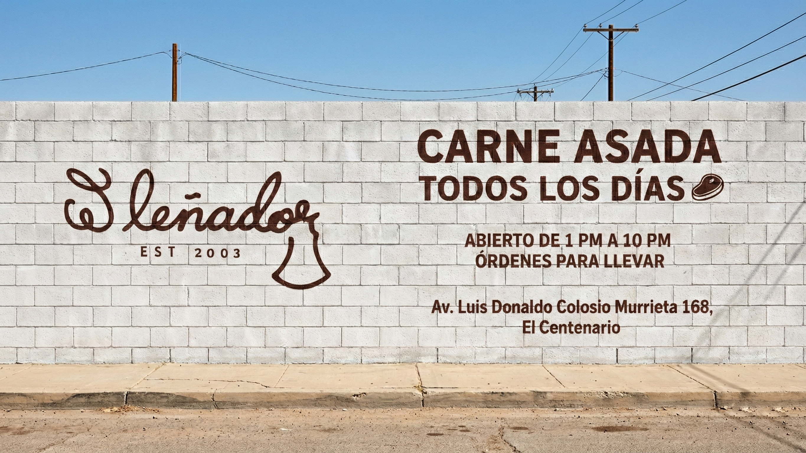 Gray cinder block wall with hand-painted Mexican rotulacion-style mural showing El Lenador cursive logo with cowbell icon on left and dark brown promotional text reading Carne Asada Todos Los Dias with business hours and address on right